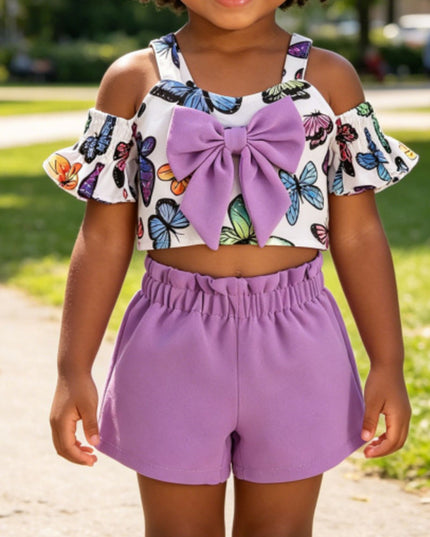 Girl's butterfly print crop top with purple ruffle shorts summer set with bow detail.