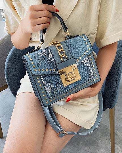 Fashion snake pattern handbag See size chart under “more details”