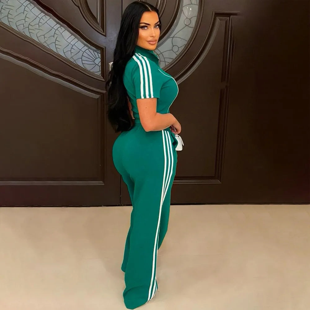 Stylish Woman in Green Tracksuit: Fashionable Sportswear Outfit