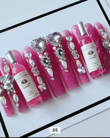 Pink acrylic press on nails with champagne