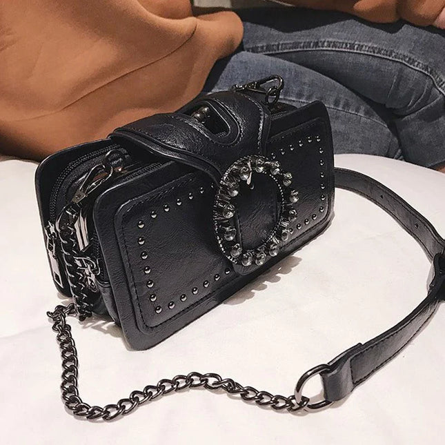 Black vintage shoulder bag with rhinestone buckle and punk rivets