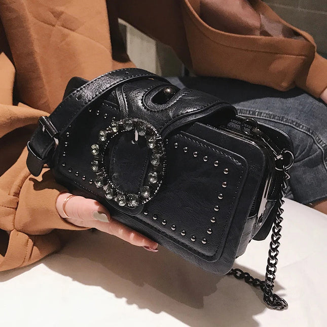 Black punk shoulder bag with rhinestone buckle and rivet decor