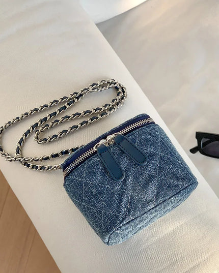 Mini denim crossbody bag for women with chain strap and quilted pattern. Fashion box purse.