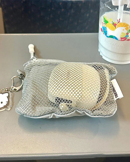 Hello Kitty charm on a mesh travel makeup bag, coin purse, mini bag with a drink